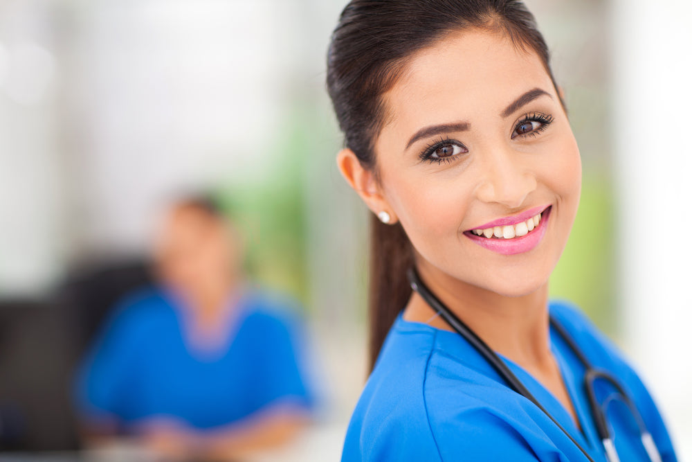 Zenutri health expert women smiling wearing medical gown