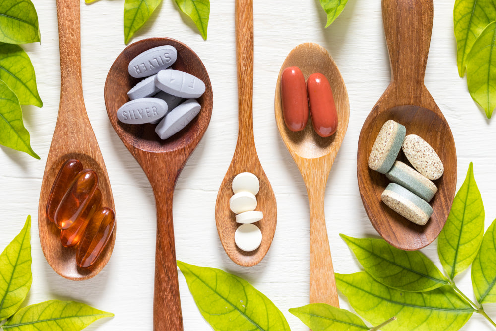 Zenutri Vitamins pill in wooden divided into four  wooden spoon  for Zenutri bundles 